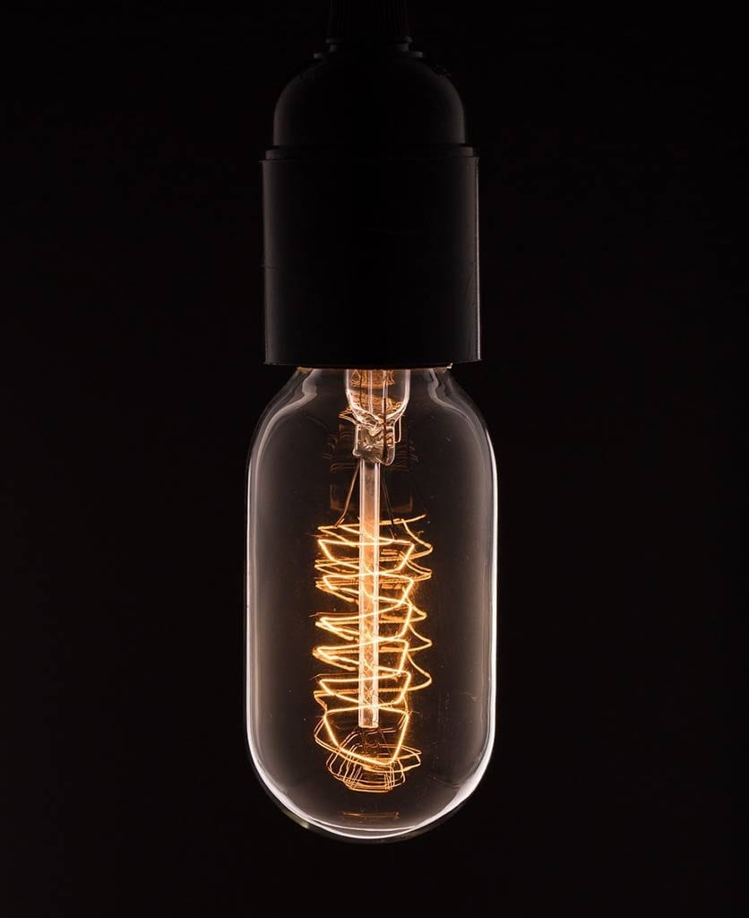 radio valve spiral light bulbs against black background