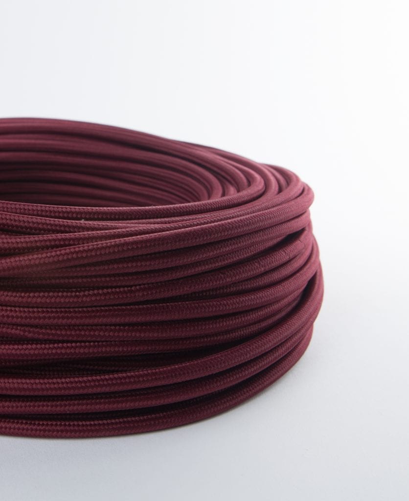 burgundy red wine fabric cable for lighting against white background