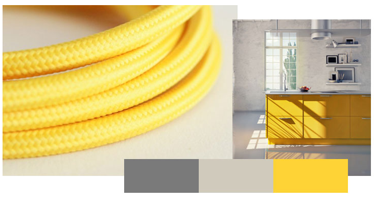 yellow fabric cable close up next to grey kitchen with yellow cupboards