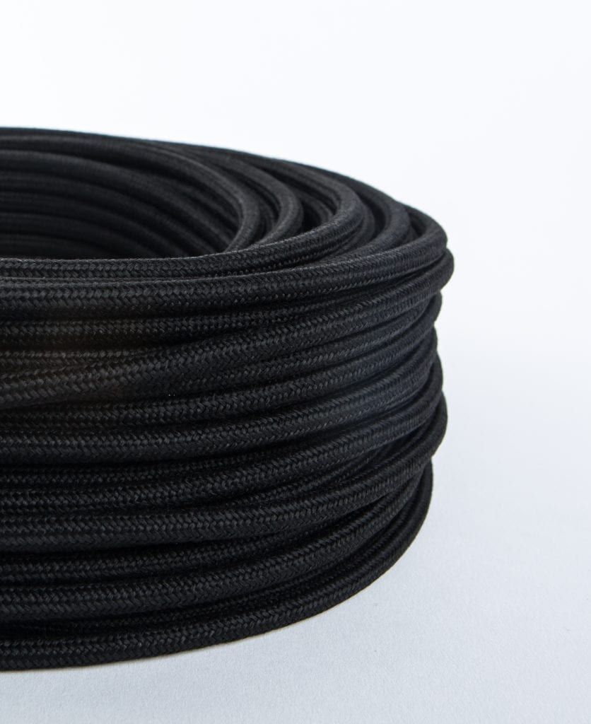 chalkboard black fabric cable against white background