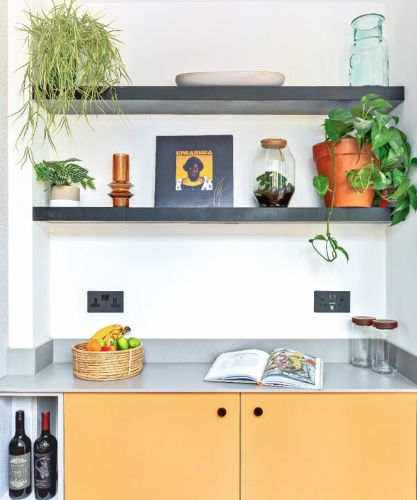 black USB sockets on a kitchen wall