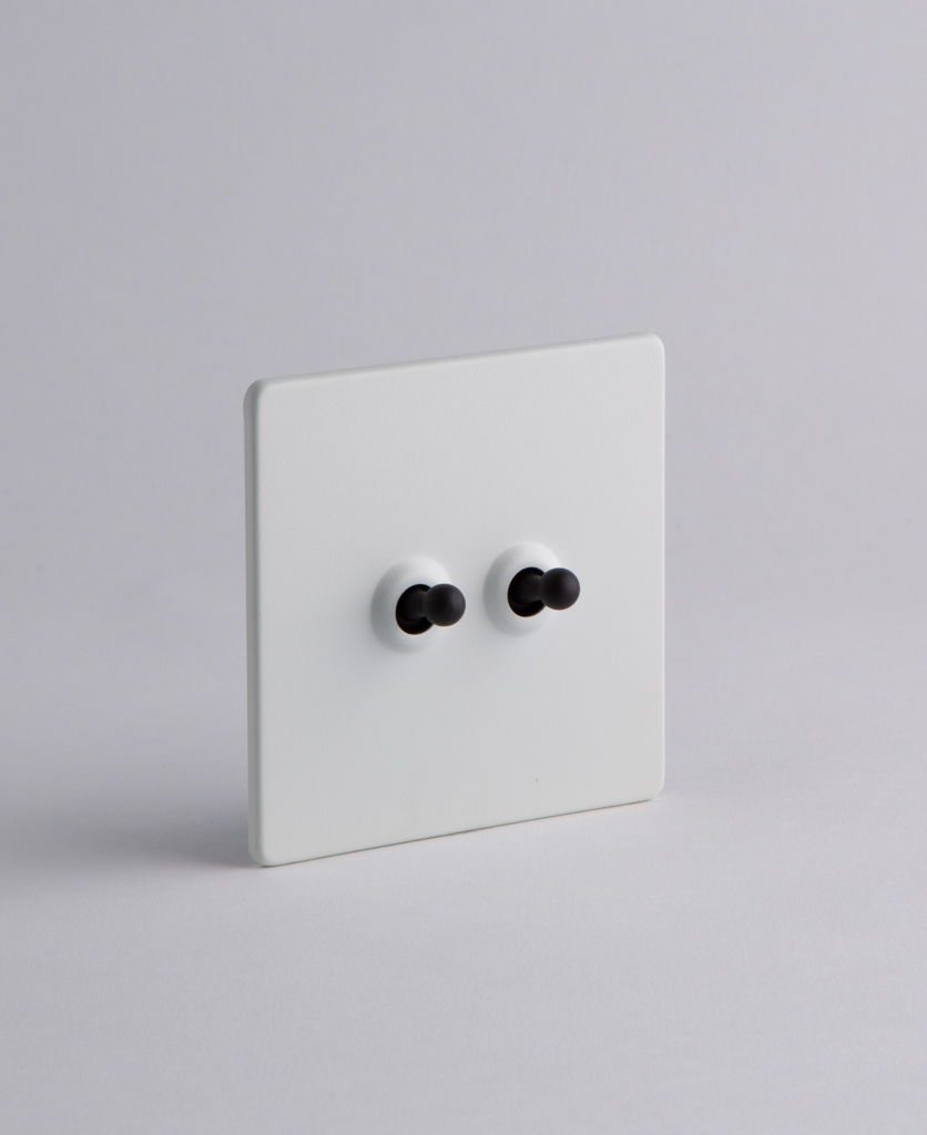White Double Toggle Switch for Lights with Black, Gold or Silver Toggles
