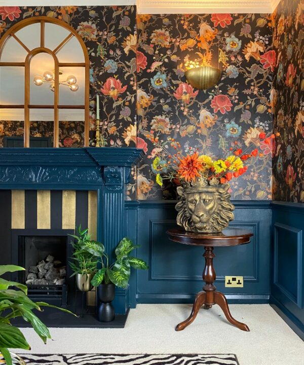 gold socket in a maximalist living room with lots of colour and patterns