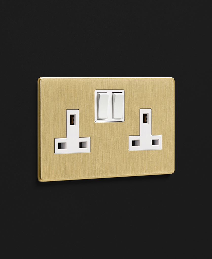 brushed gold brass double plug socket with white inserts