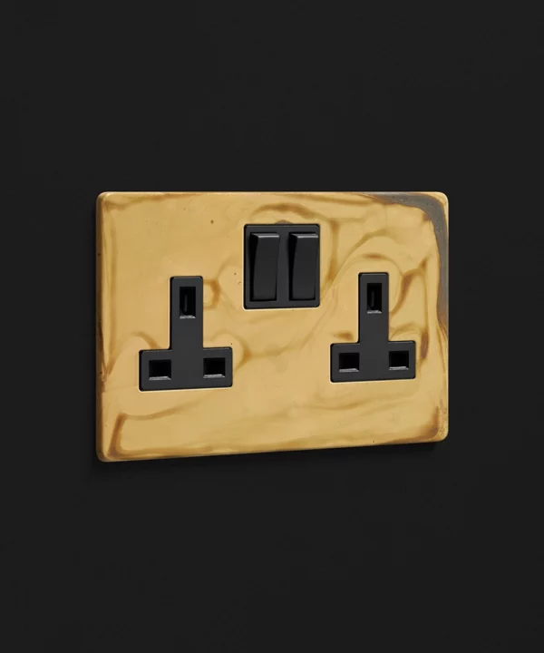 smoked gold two gang double plug socket with black inserts