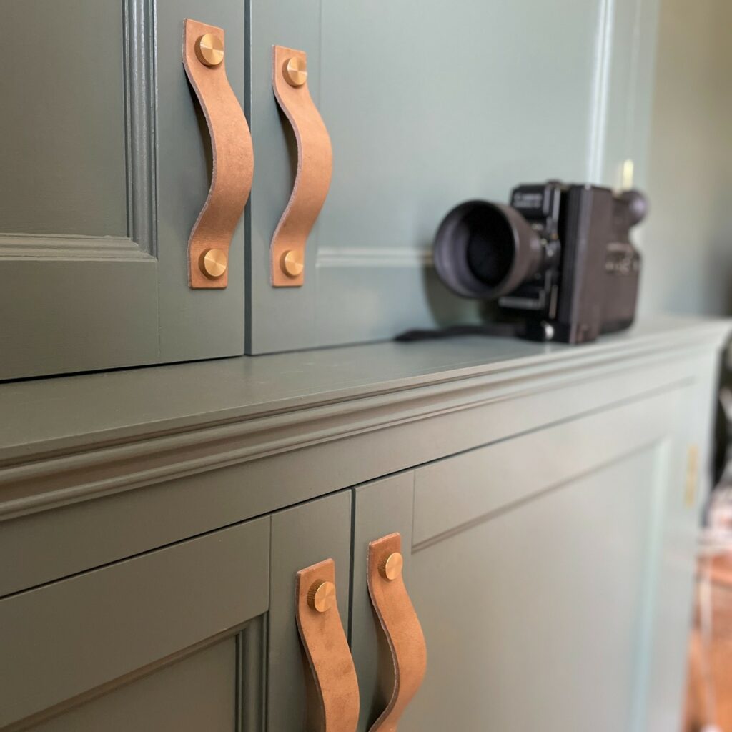 leather handles on cupboard door