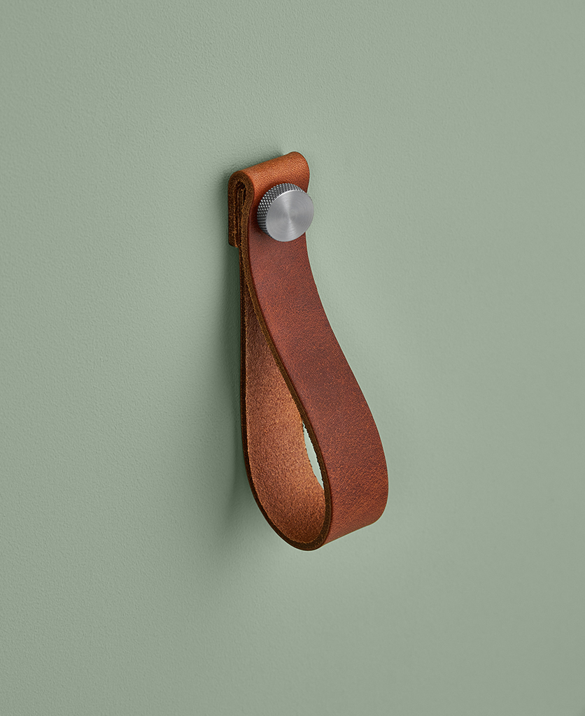 large dark tan magni with brushed nickel knob