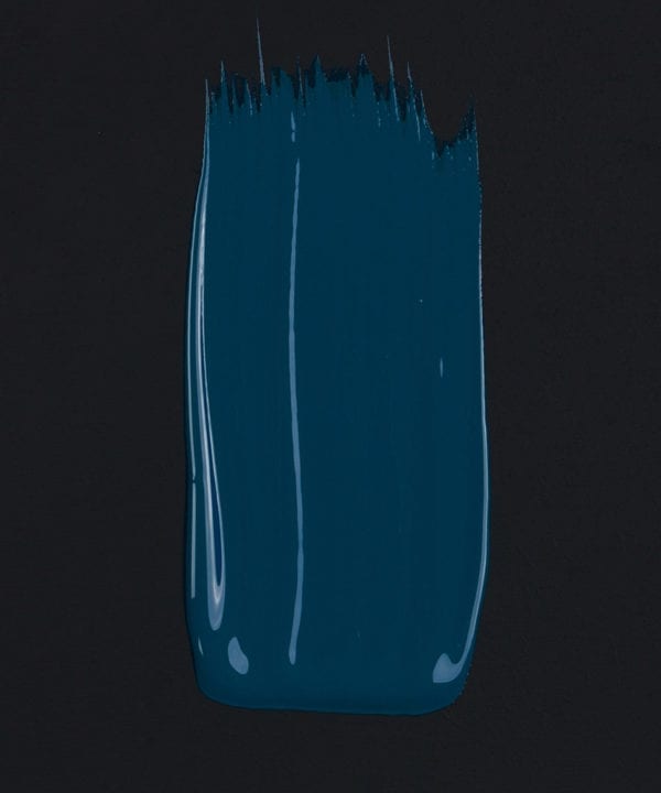 In deep water rich blue paint swatch on dark background