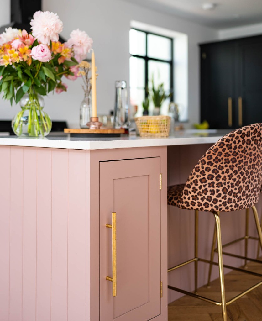 pink kitchen unit with gold Dowsing & Reynolds skyscraper handles