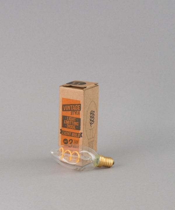 E14 LED candle bulbs with spiral filament against white background with packaging