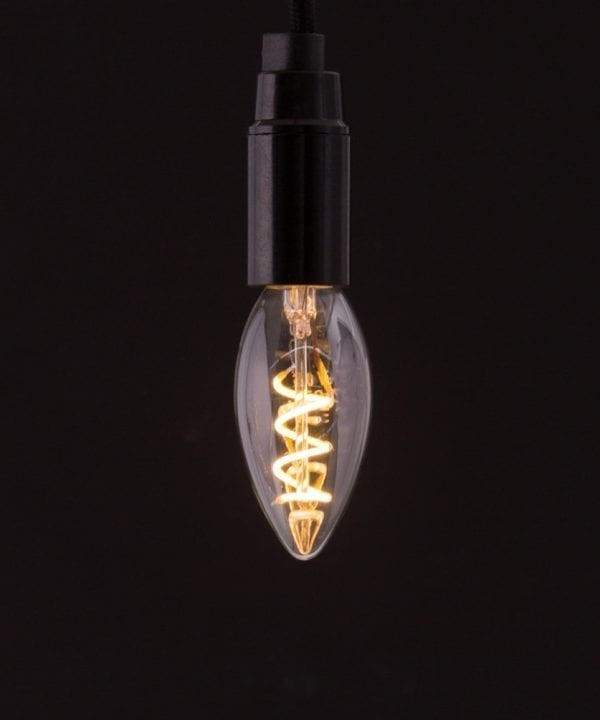 E14 LED candle bulbs with spiral filament against black background