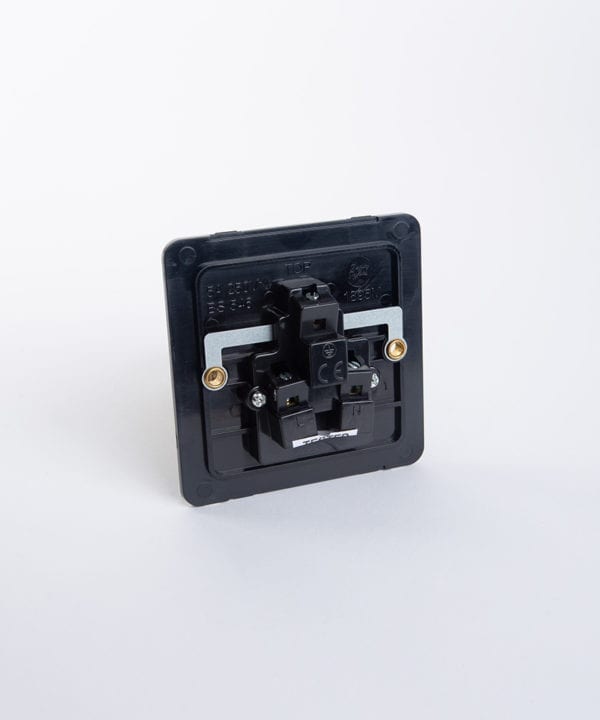 back view of round 3 pin socket back plate against white bnackground