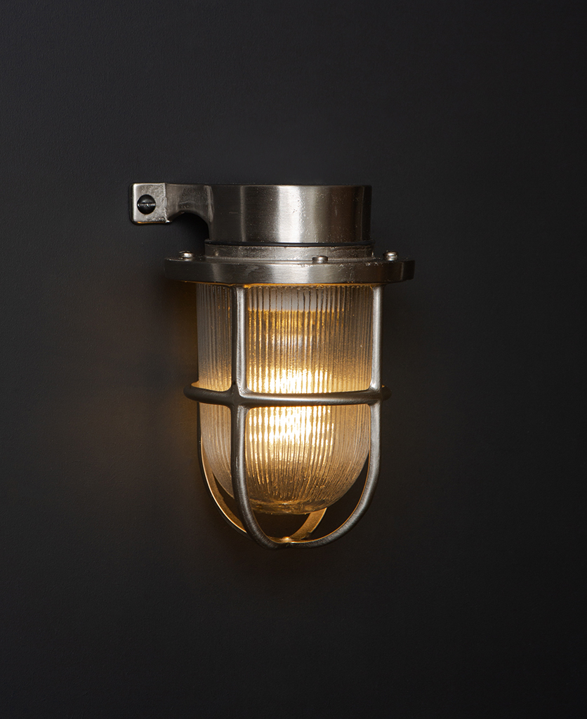 silver lit simon exterior bulkhead lights against black background