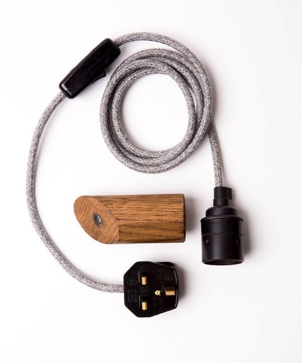 dark oak peg with grey jumper cable flatlay on white