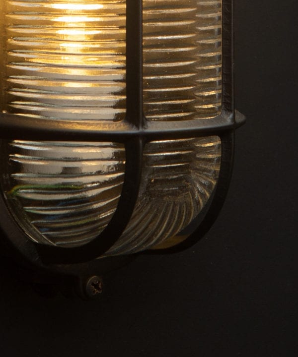 dave pewter bulkhead wall light close up with bulb