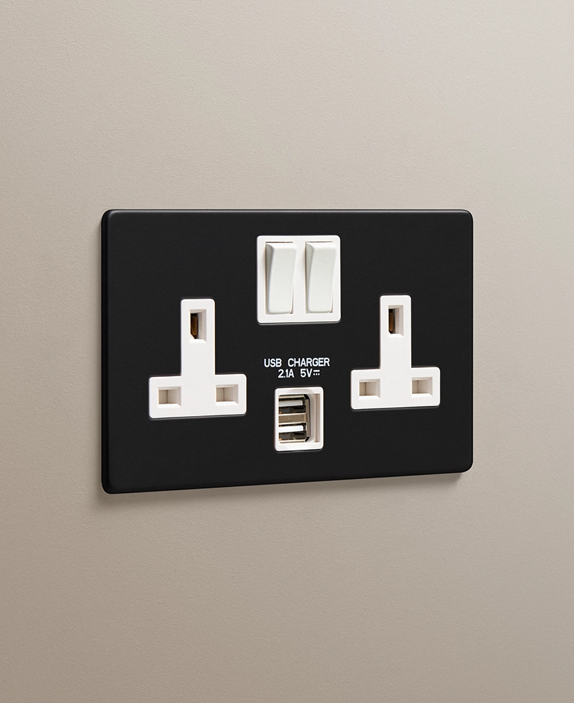 matt black double 2 gang socket with USB & USBC charging ports on a neutral taupe painted wall