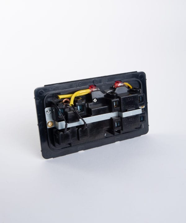 back view of 45 amp cooker isolator switch backplate against white background