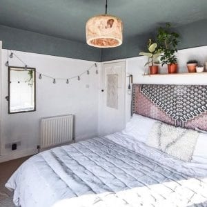 white and soft grey bedroom with white bedding