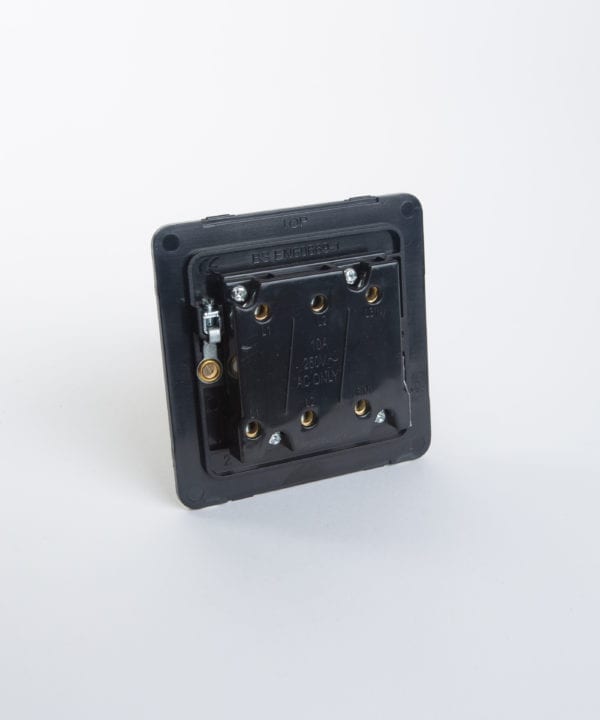 triple pole fan switch back plate against white background