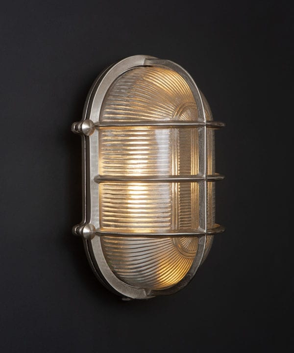 lit silver big steve bulkhead on black wall