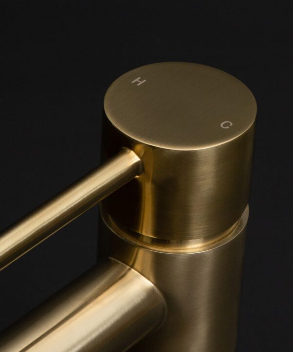 gold kagera tap close up of handle on black background