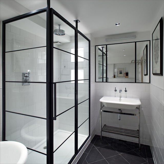 black and white bathroom with black crittal shower screen