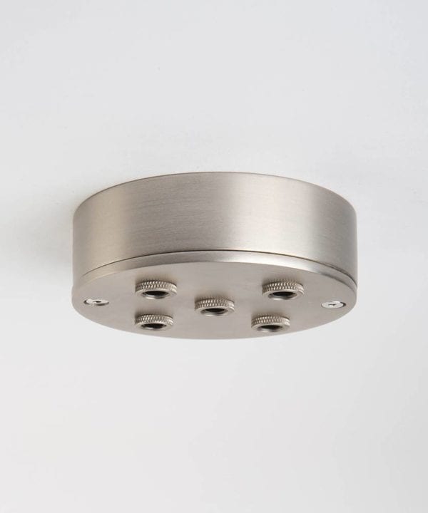 silver five point ceiling rose against white background