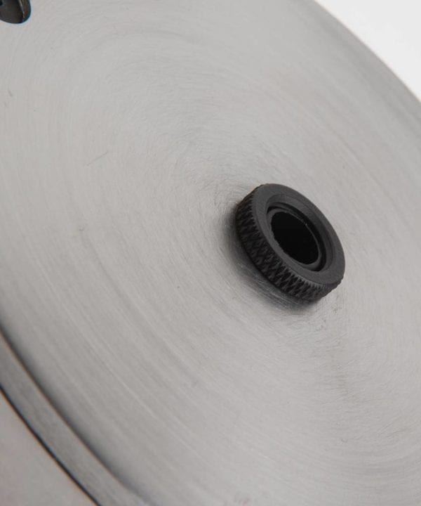 closeup of raw steel ceiling rose