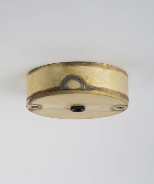 smoked gold one point ceiling rose against white background