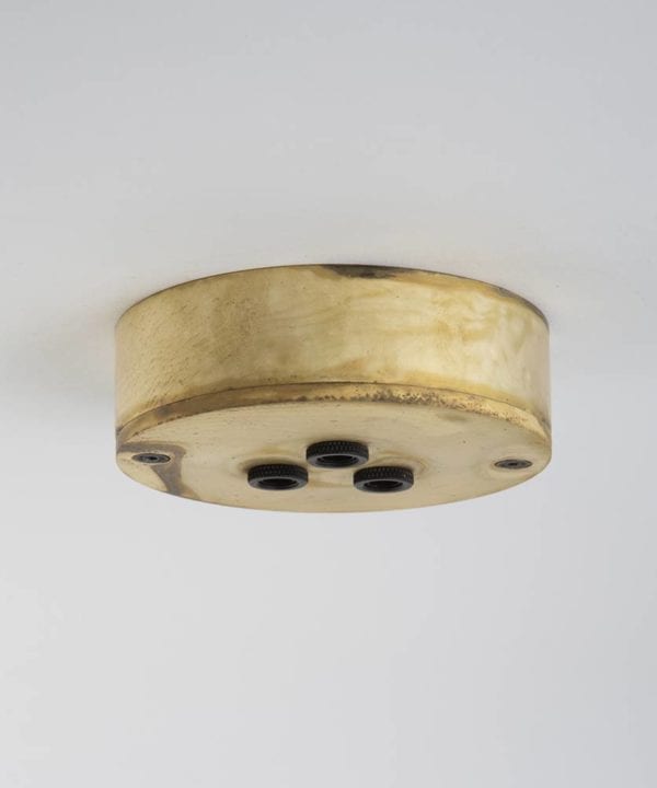 smoked gold three point ceiling rose against white background