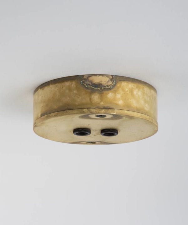 smoked gold two point ceiling rose against white background