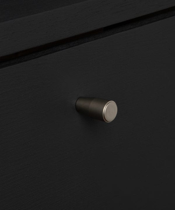 minimalist knob silver on black drawer