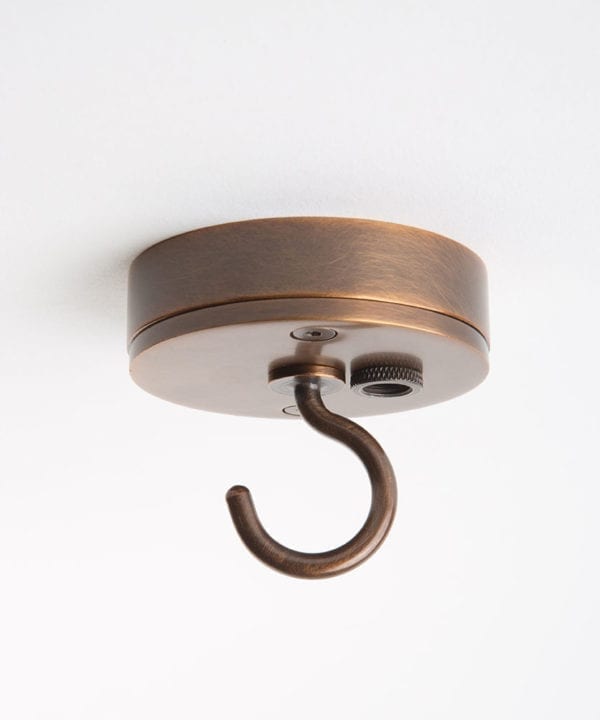 Small bronze ceiling rose with c shaped hook against white background