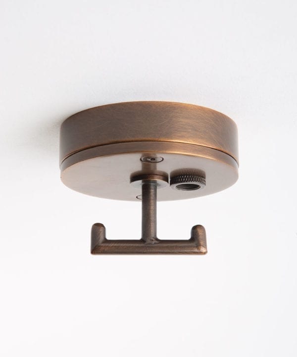 brewer's brass ceiling rose with t shaped hook against white background