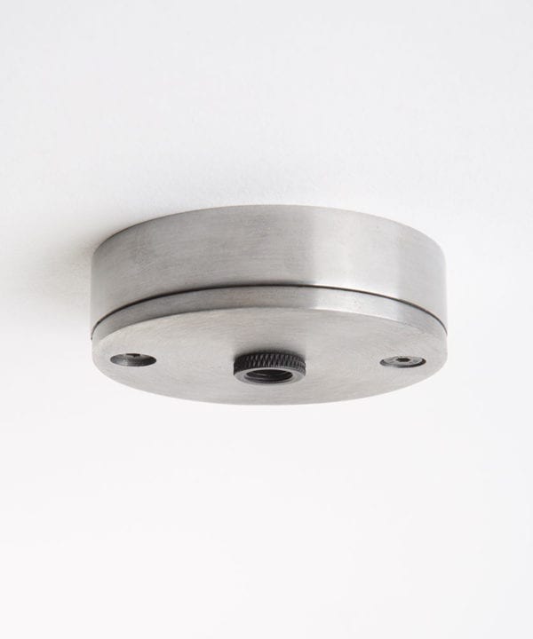 steel ceiling rose against white background