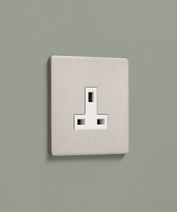 brushed silver nickel unswitched 1 gang single socket on a dusky sage painted wall