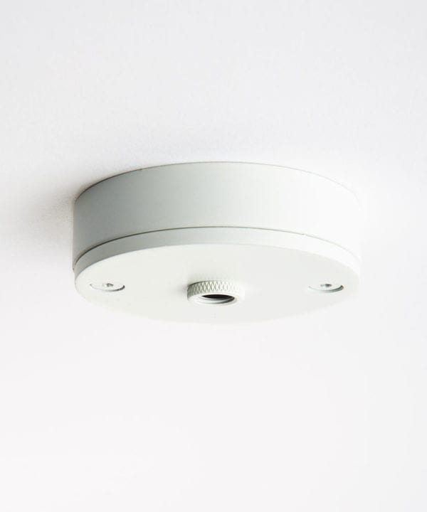 small white ceiling rose against white background