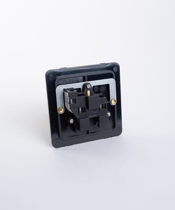 single unswitched wall socket back plate against white background