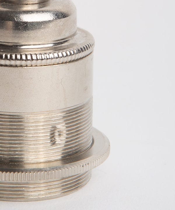 closeup of nickel threaded e27 bulb holder against white background