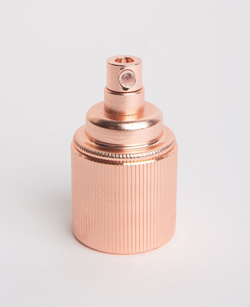 polished copper e27 ribbed screw lamp holder against white background