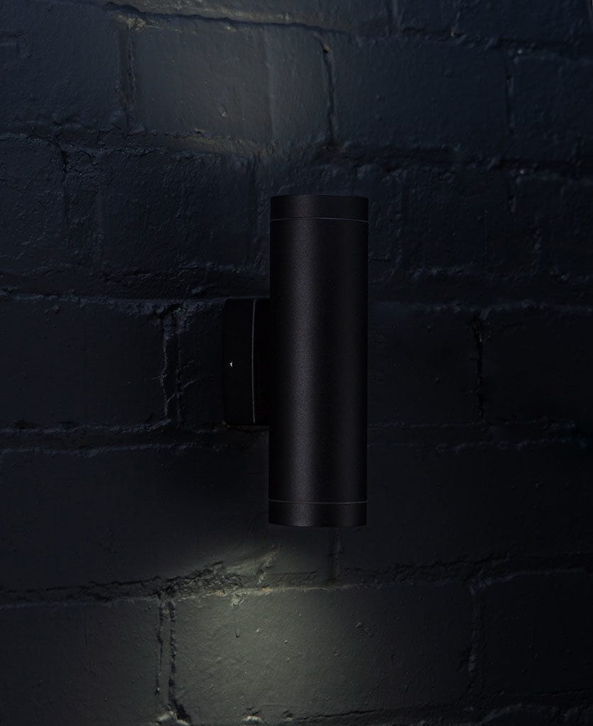 vega black against black brick wall