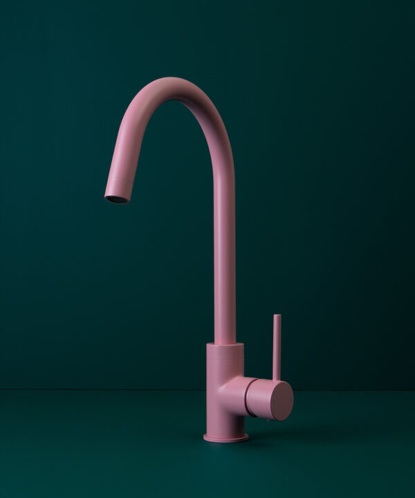 pink tinkisso tap on dark green background