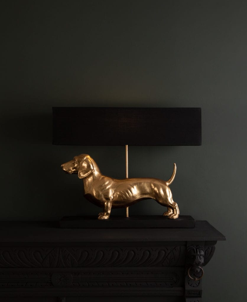 fred dachshund table lamp against black background