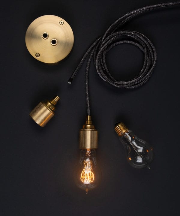 custom ceiling light components assembled on a black background