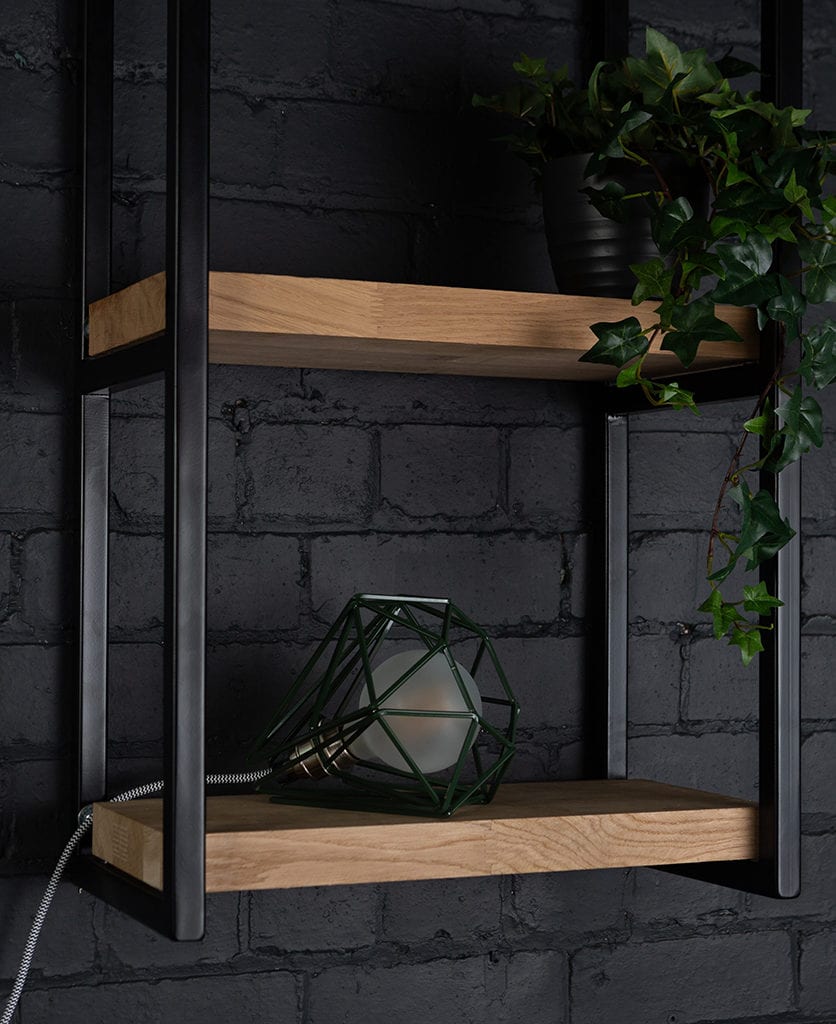 knox shelf brackets on black painted brick wall with matcha table lamp and faux fern