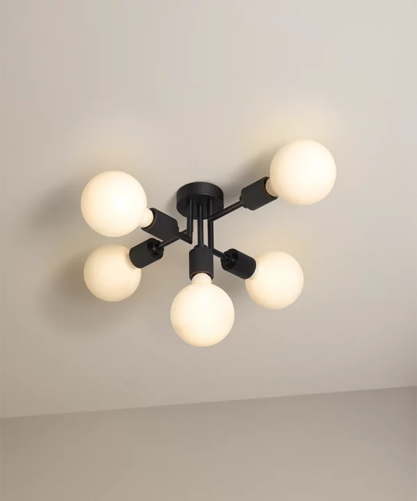 black industrial style ceiling light semi flush to the ceiling with five opaque glass globe bulbs