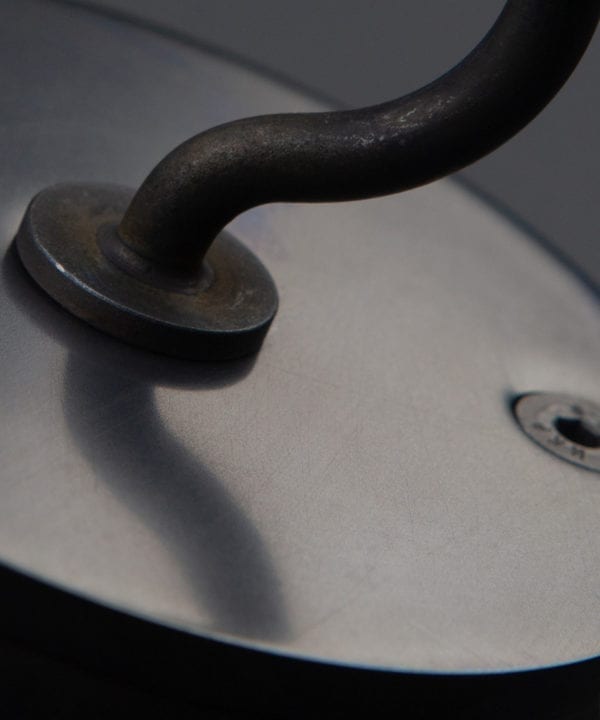 closeup of antique black ceiling hook