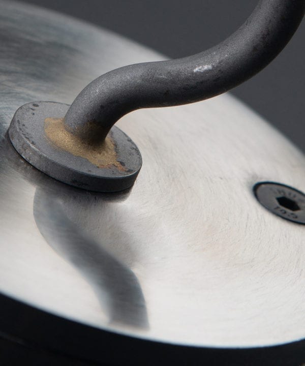 closeup of raw steel ceiling hook