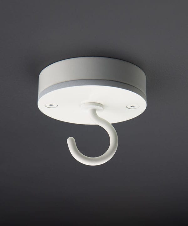 white ceiling hook against black background