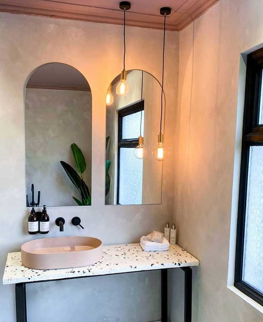 black wall tap in a modern bathroom